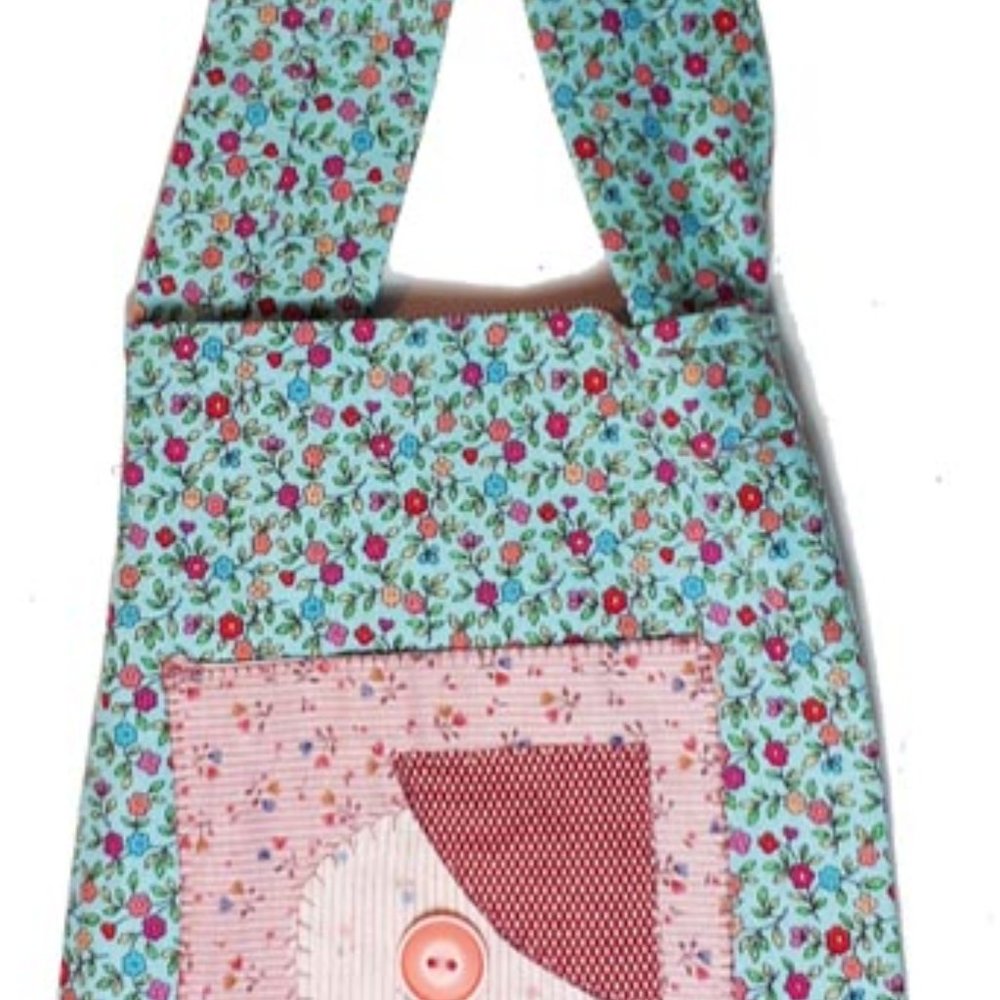 Handcrafted everlasting gift bag in 100% cotton. Front pocket